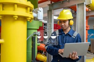 maintenance-technician-heating-plantpetrochemical-workers-supervise-operation-gas-oil-pipelines-factoryengineers-put-hearing-protector-room-with-many-pipes